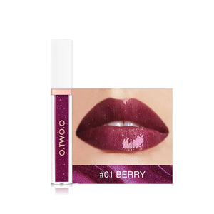 Berry shade liquid lipstick with glossy finish, shown on lips for makeup look