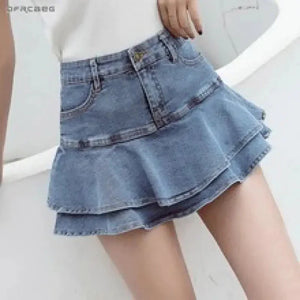 Woman wearing a tiered denim mini skirt with layered ruffles, casual fashion style