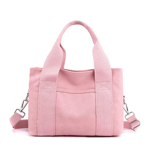 Light pink canvas tote bag with double handles and detachable shoulder strap
