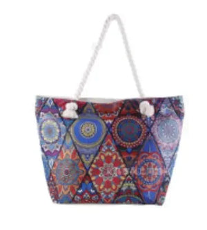 Colorful geometric print tote bag with white rope handle on white background