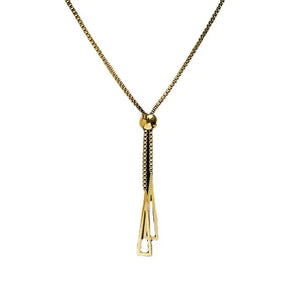Gold geometric pendant necklace with adjustable lariat design on white background