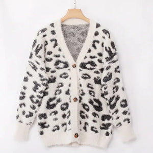 White fuzzy leopard print cardigan with black spots and button front