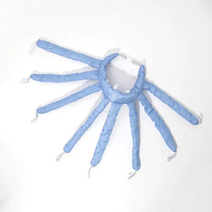 Blue octopus-shaped hair curler on white background, heatless curling tool
