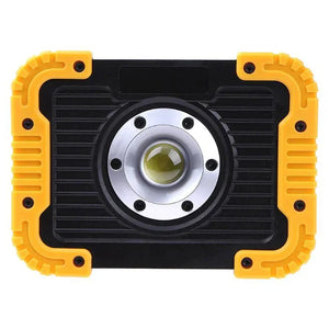 Portable LED work light with rugged black and yellow frame, front-facing lens
