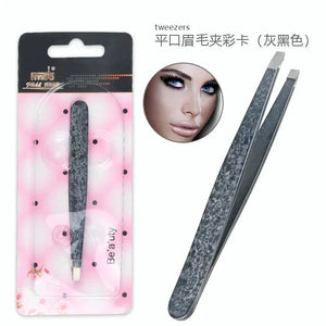 Gray marble-patterned slant tip tweezers for eyebrow grooming in retail packaging