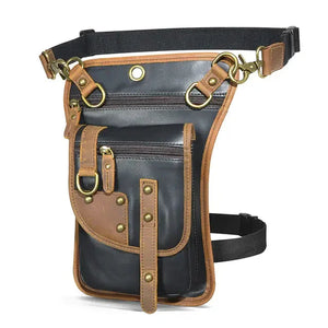 Black and brown leather utility belt bag with brass hardware and zippered pockets
