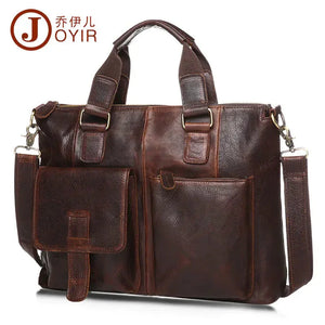 Brown leather shoulder bag with front pockets and top handles, detachable strap