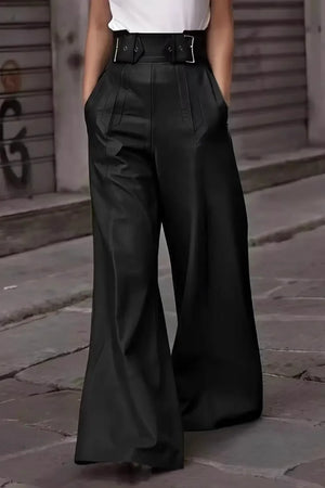 High-waisted black wide-leg pants with belt details, street style fashion