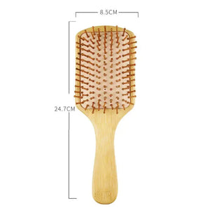 Wooden paddle hairbrush with dimensions 24.7cm by 8.5cm, flat bristles, home essential
