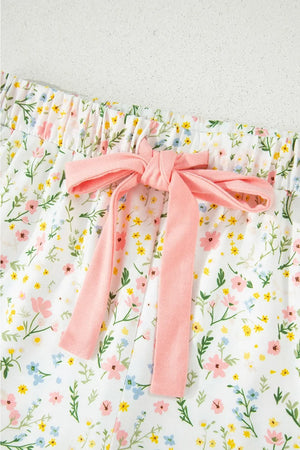 White floral kids shorts with pink bow and elastic waistband