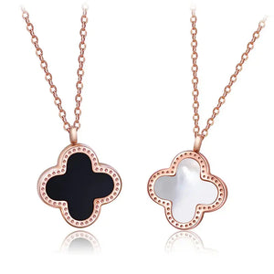 Rose gold clover pendant necklaces with black and white enamel on delicate chains