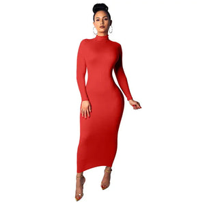 Woman wearing a red long sleeve bodycon maxi dress with high neckline, standing on white background