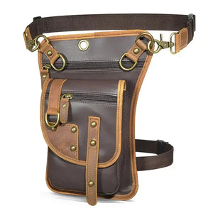 Brown leather utility belt bag with buckle straps, multiple pockets, and brass hardware