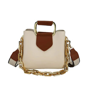 Beige and brown handbag with gold chain strap and top handle, modern fashion accessory
