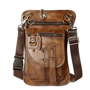Brown leather crossbody bag with multiple zipper pockets and adjustable strap