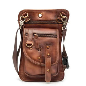 Brown leather crossbody bag with multiple zippered pockets and metal accents